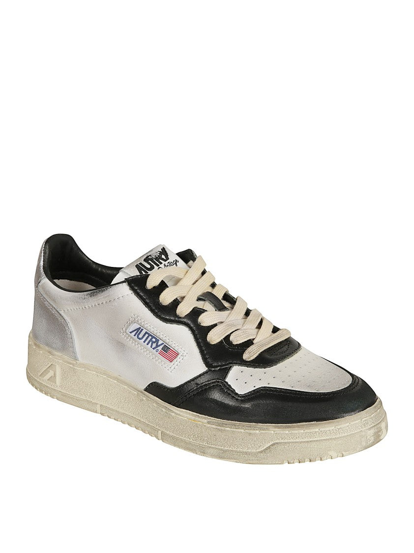 Autry Low-Top Sneakers In Crackled Leather With Handcrafted Worn Effect