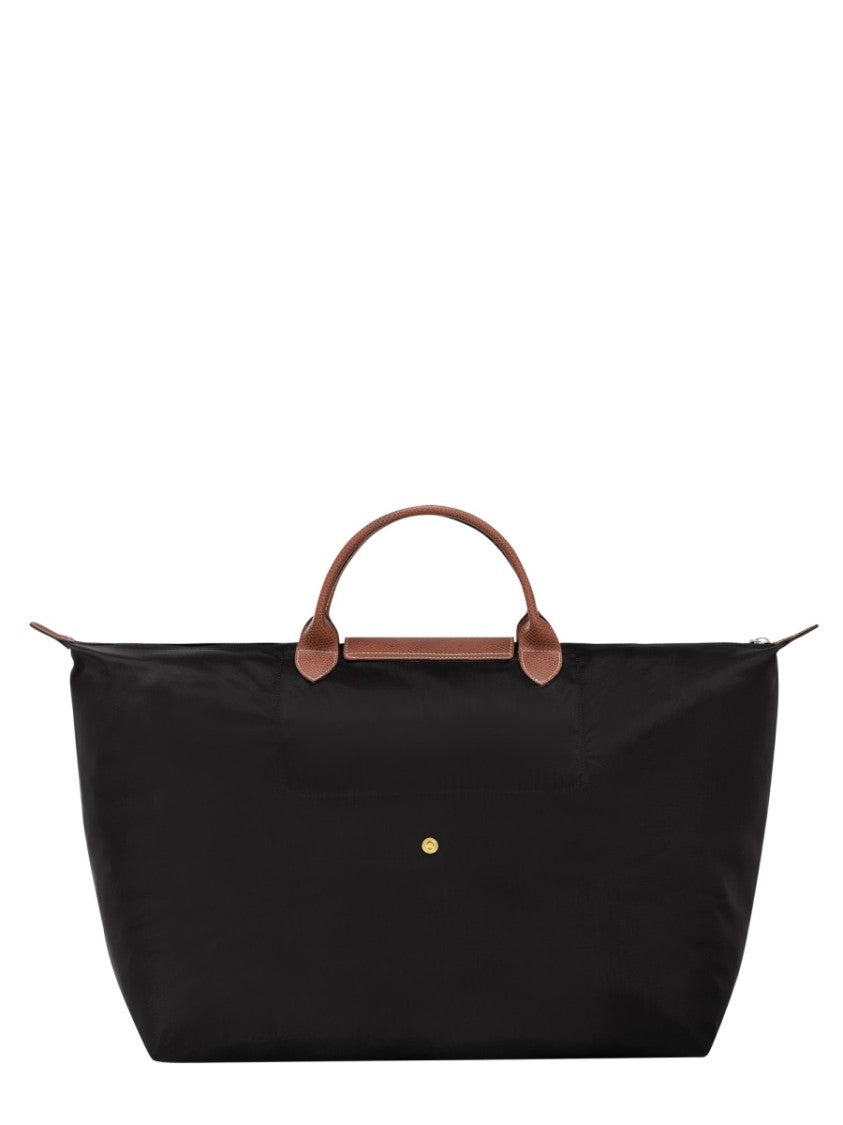 Longchamp Spacious Travel Bag With Leather Handles And Subtle Logo