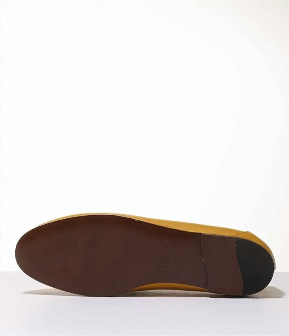 Tod's Sleek Mustard Leather Loafers With T-Buckle Detail