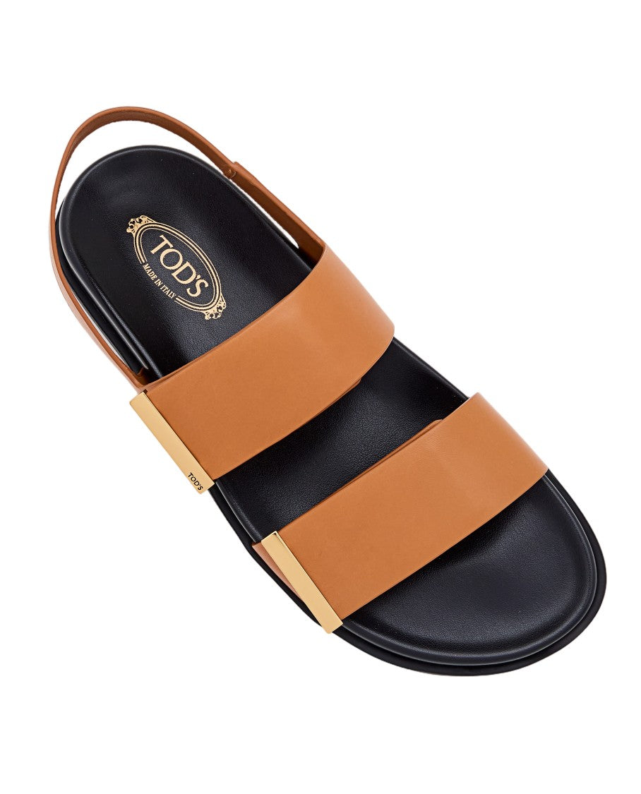 Tod's Flat Sandals With Adjustable Calfskin Straps And Skirt Sole