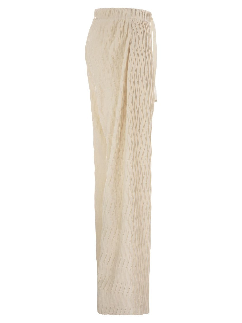 Herno Trousers With Crumpled Effect And Wavy Pattern