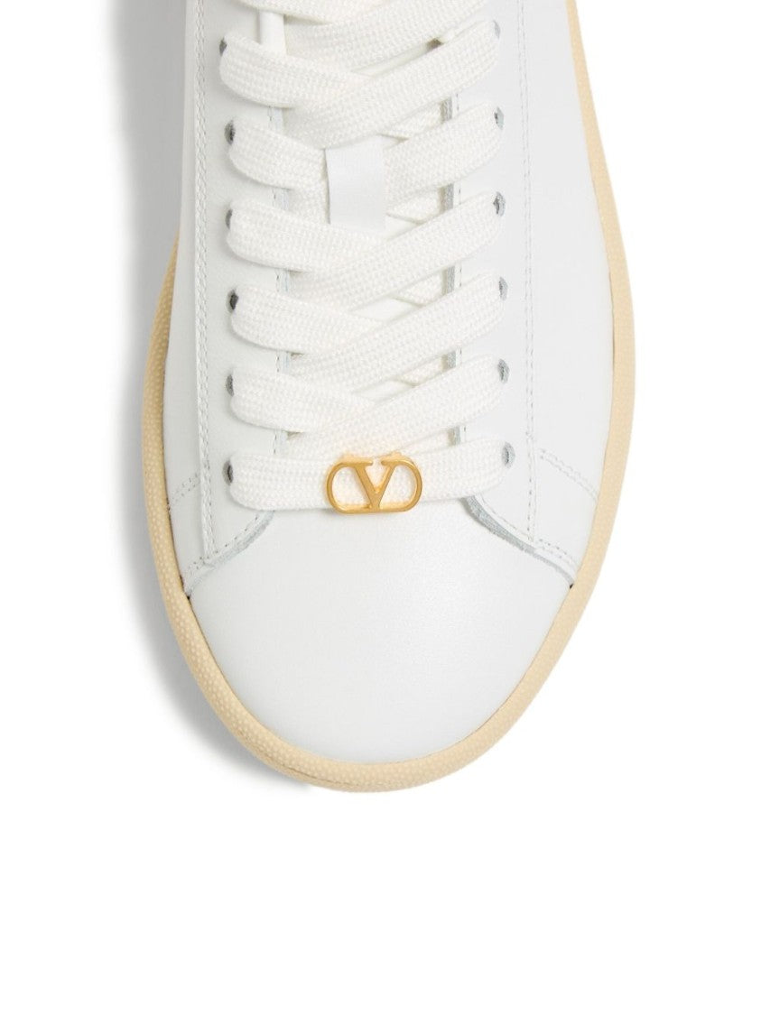 Valentino Garavani Sleek White Leather Flats With Gold-Tone Logo