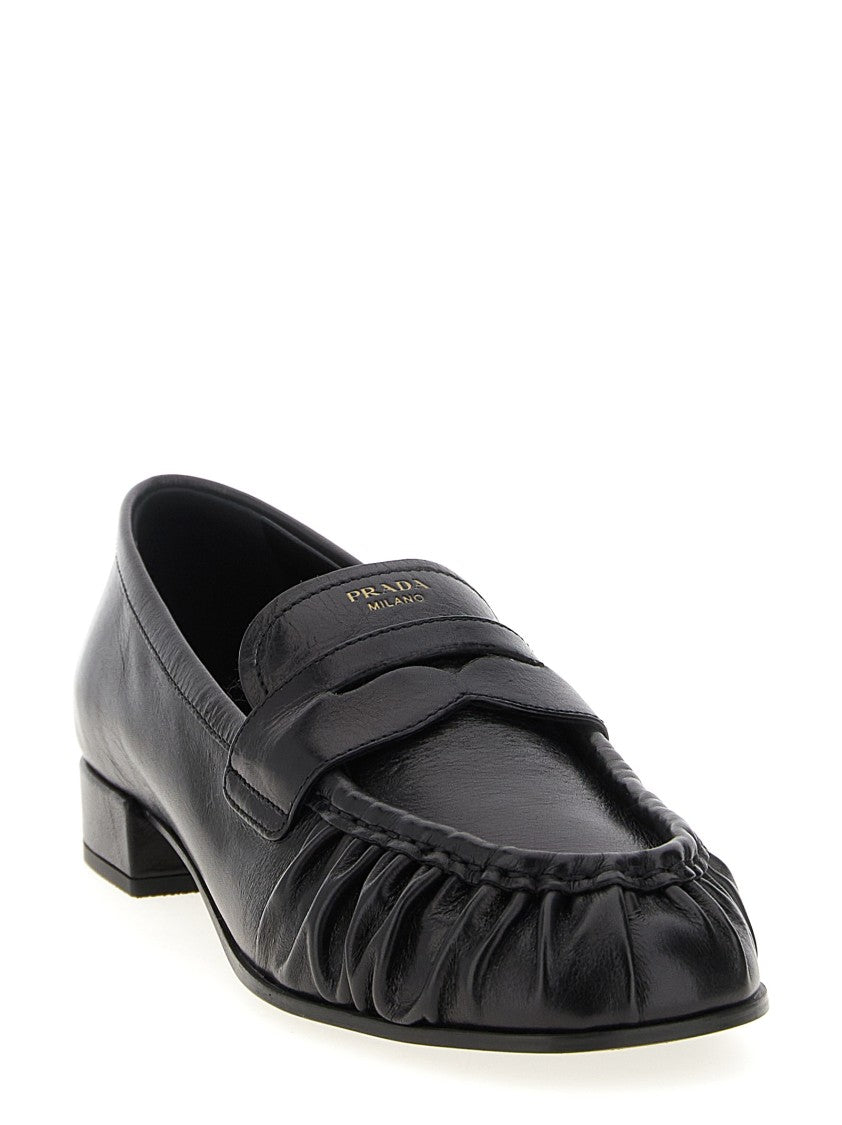 Prada Curled Toe Moccasins