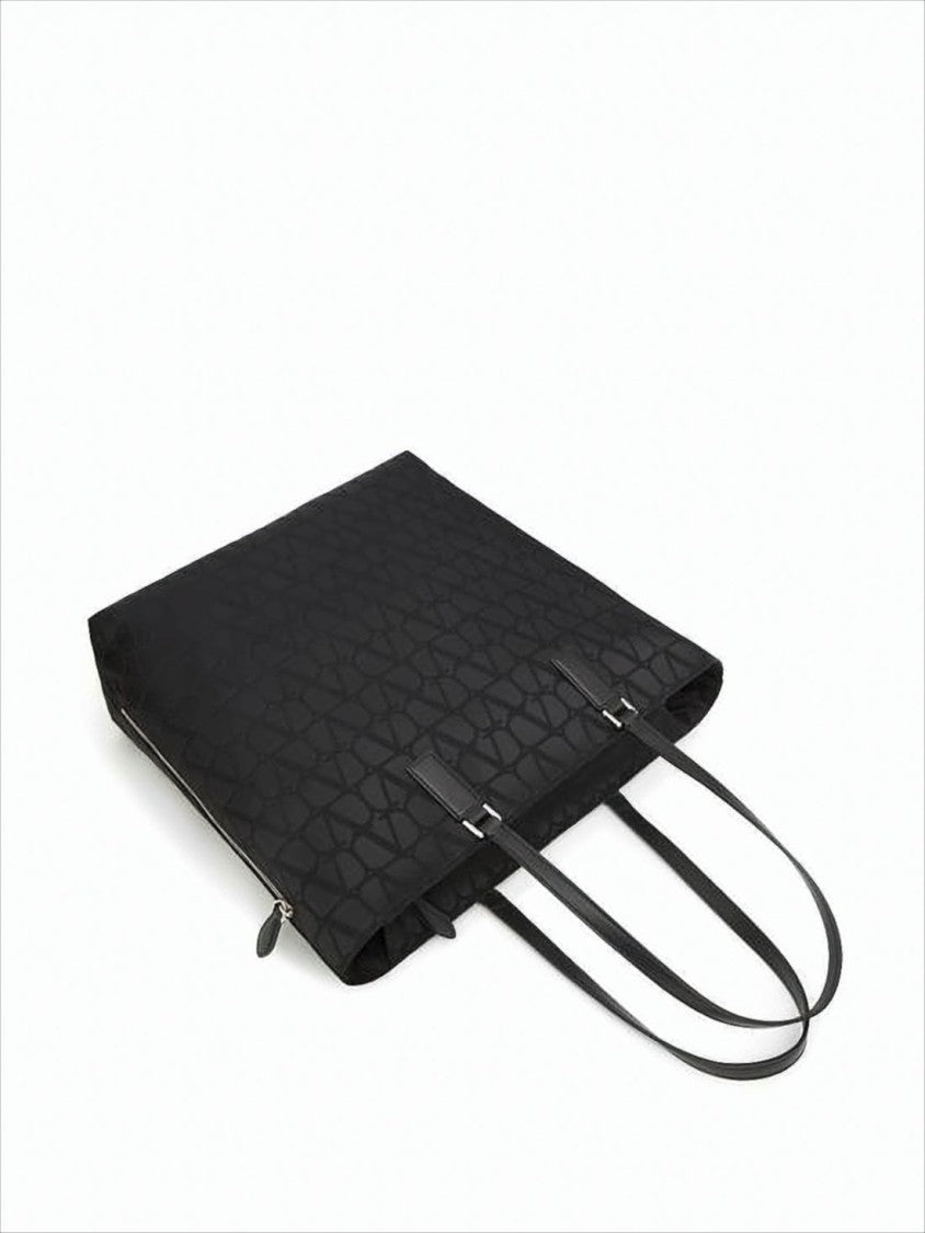 Valentino Garavani Structured Black Tote Bag With Embossed Logo Motif