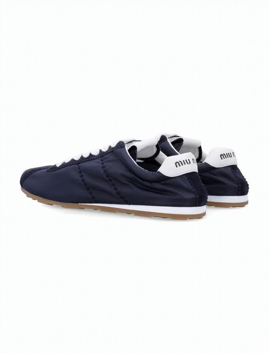 Miu Miu Quilted Low-Profile Sneakers With Contrasting Heel Tab