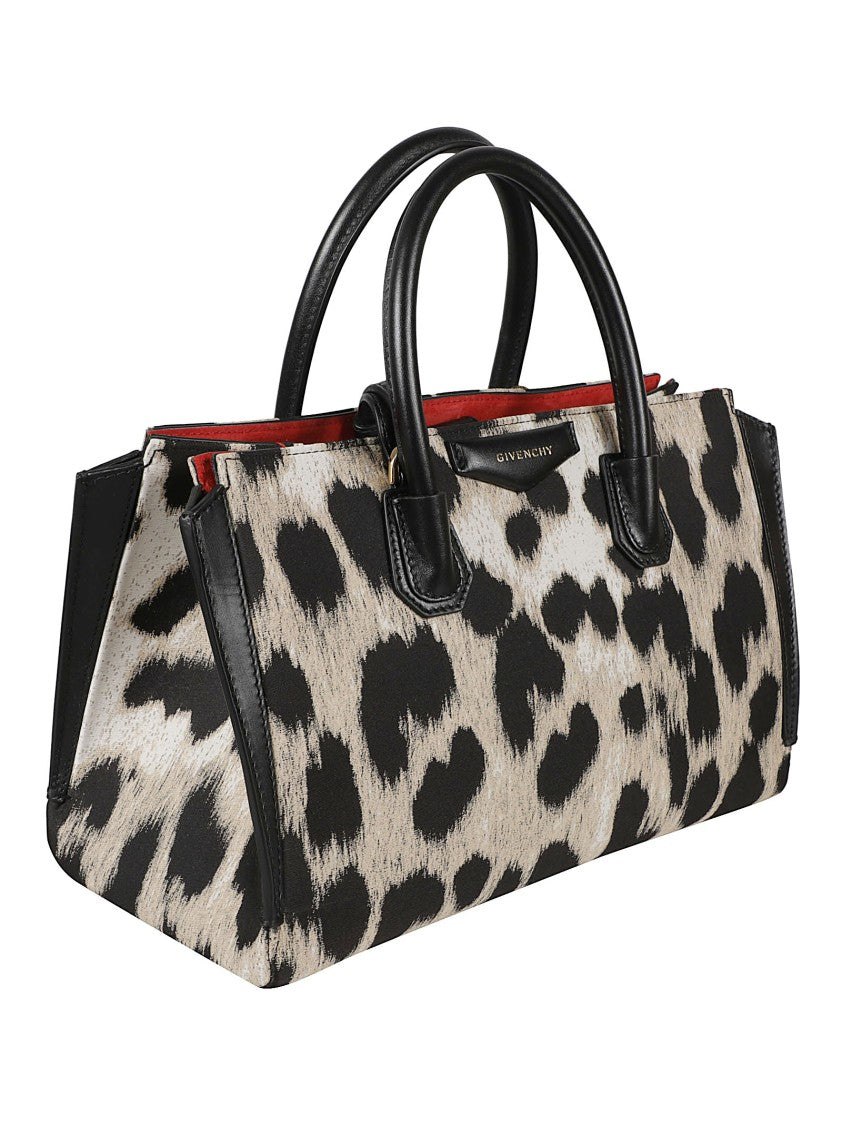 Givenchy Rectangular Handbag With Bold Animal Print And Leather Accents