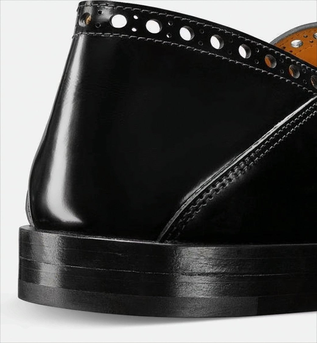 Christian Dior Sleek Backless Loafers With Perforated Detailing And Branded Plaque