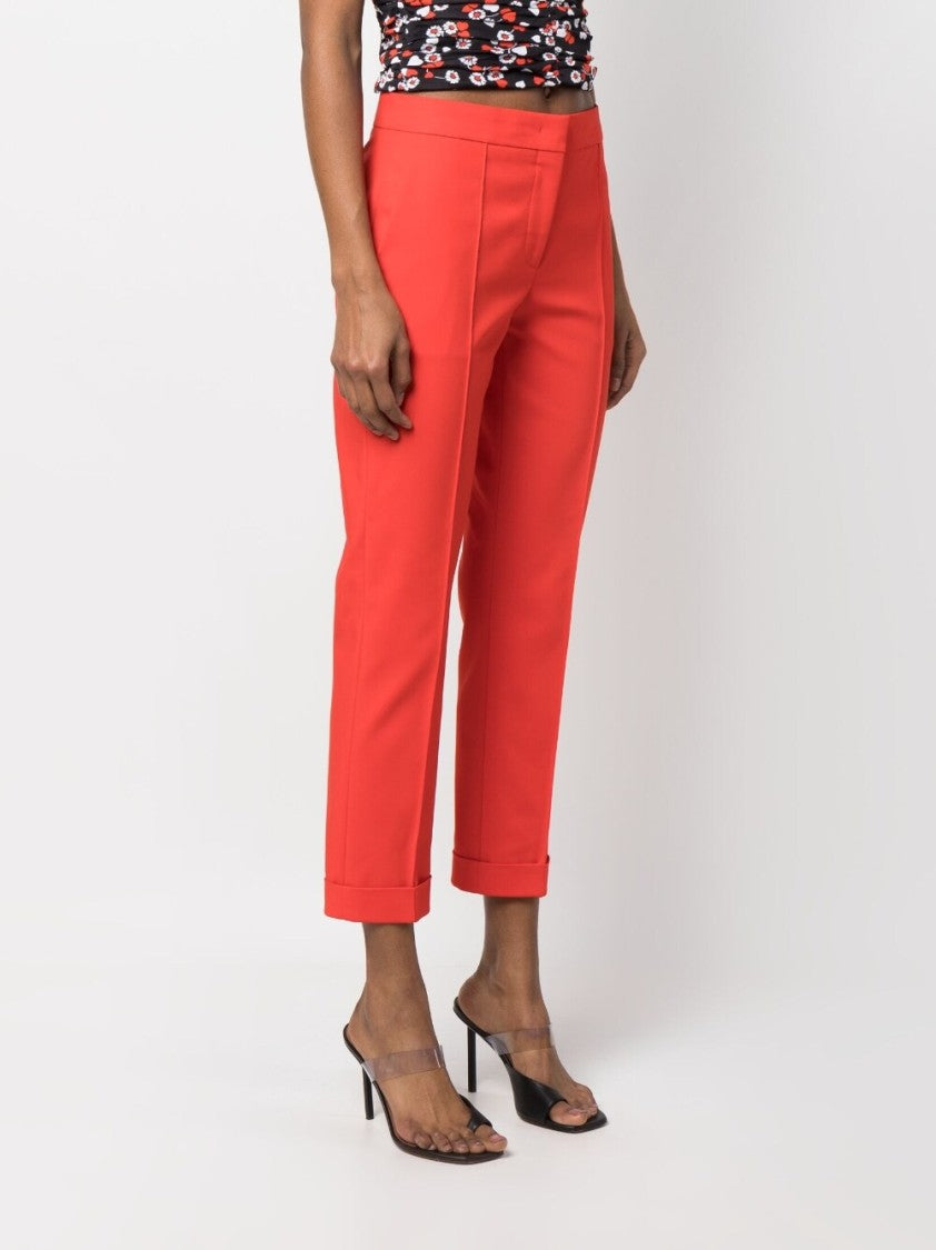 Moschino Slim Cut Cropped Trousers With Exposed-Seam Detailing