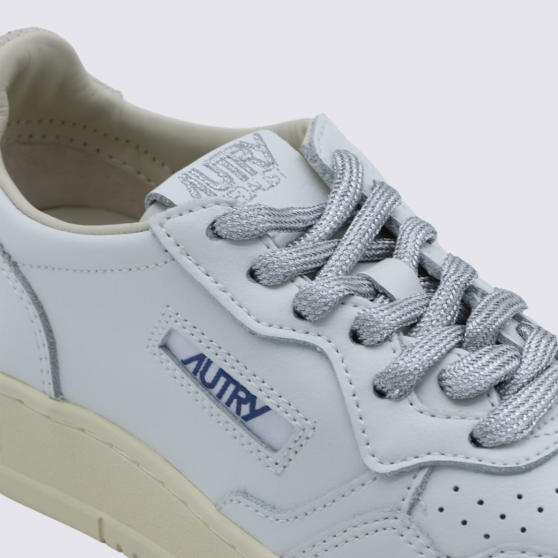 Autry Minimalist White Leather Sneakers With Perforated Detailing