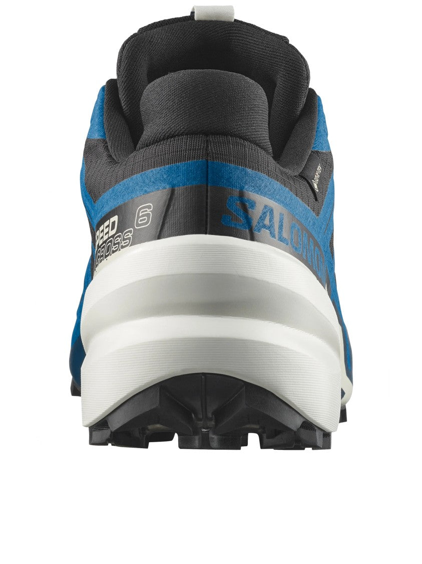 Salomon Trail Running Sneakers With Rugged Design And Vibrant Overlays