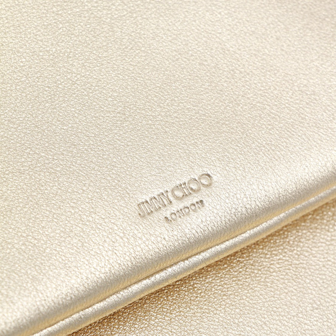 Jimmy Choo Metallic Gold Handbag With Flap Closure And Decorative Tassel