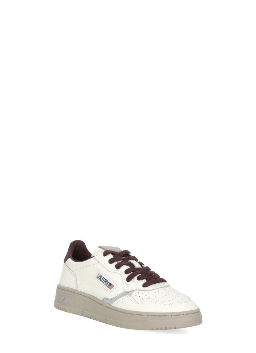 Autry Wrinkled Leather Sneakers With Burgundy Accents And Metallic Details