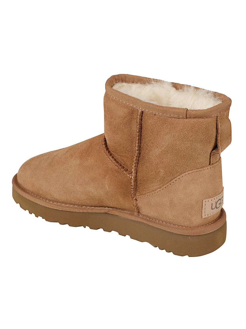 Ugg Suede Ankle Boots With Plush Shearling Lining And Textured Sole