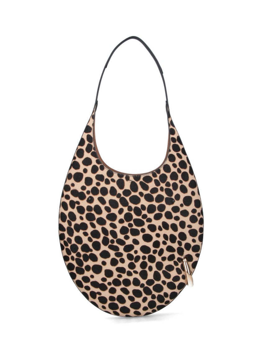 Tory Burch Crescent-Shaped Handbag With Bold Spotted Pattern