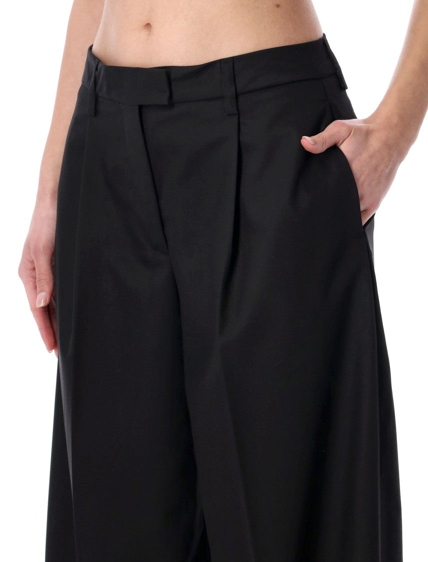 The Latest Deva Fluid Wide Leg Pleated Trousers