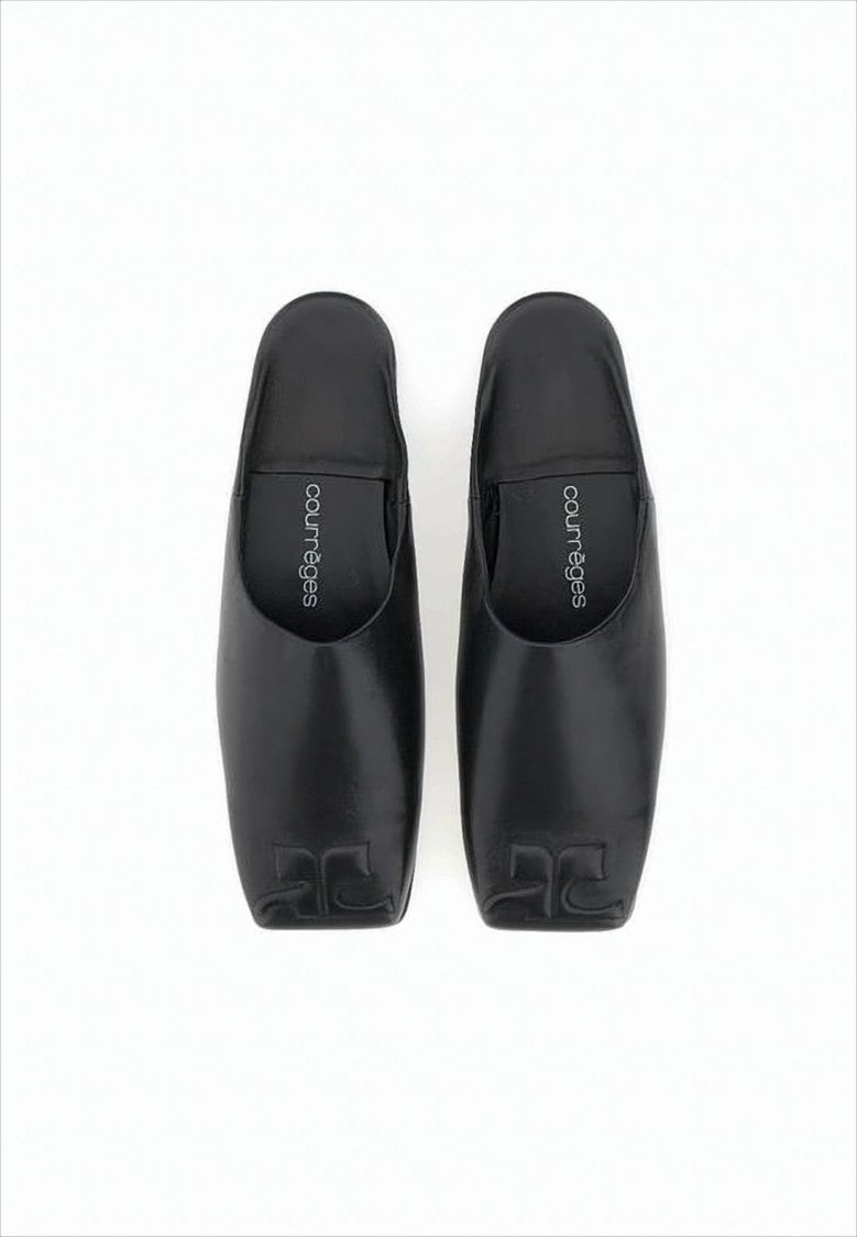 Courrèges Minimalist Black Lambskin Slip-On Mules With Embossed Detail
