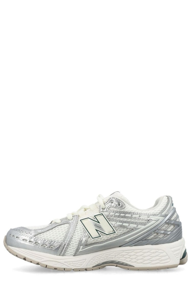 New Balance Low-Top Sneakers With Silver Accents And Cushioned Sole