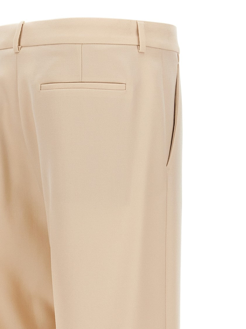 Valentino Garavani Wide Leg Wool Trousers With Turn-Up Hem