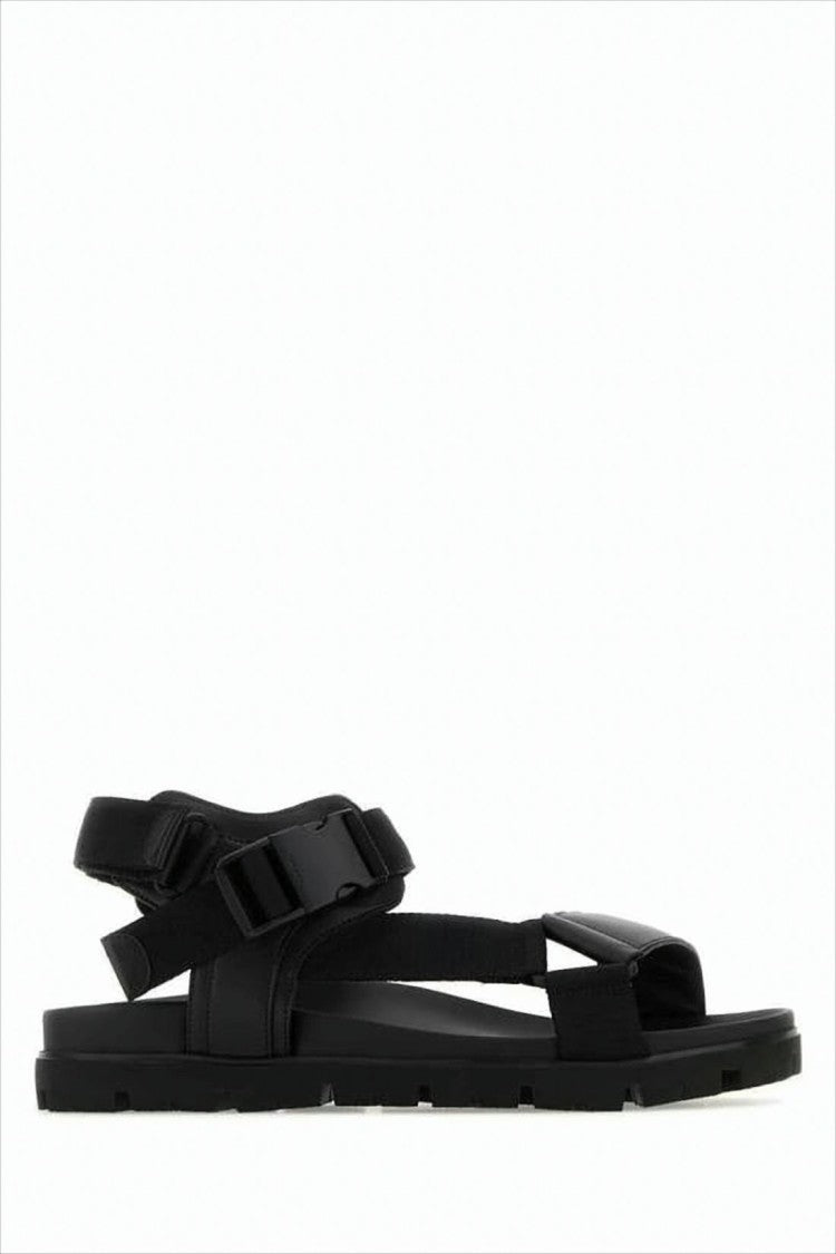 Prada Minimalist Black Sandals With Adjustable Straps And Secure Buckle