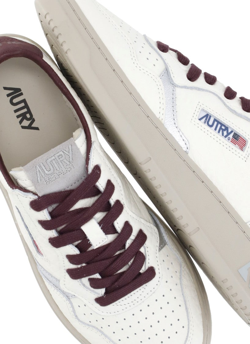 Autry Wrinkled Leather Sneakers With Burgundy Accents And Metallic Details