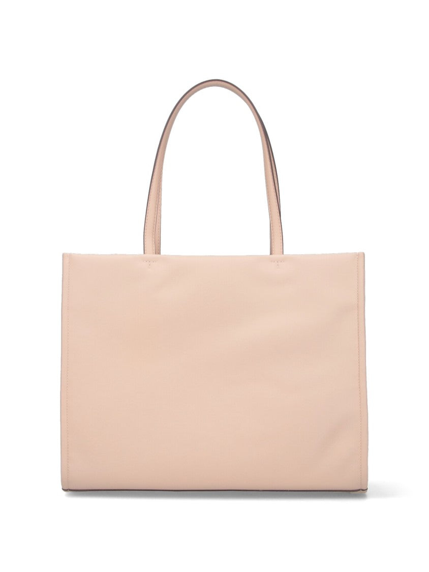 Tory Burch Structured Pink Handbag With Minimalist Design