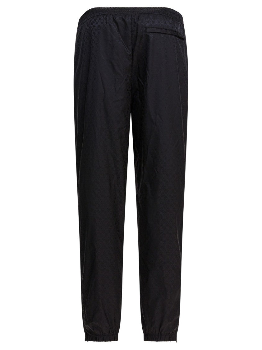 Alexander Mcqueen Relaxed Fit Trousers With Zip Detail And Tonal Finish
