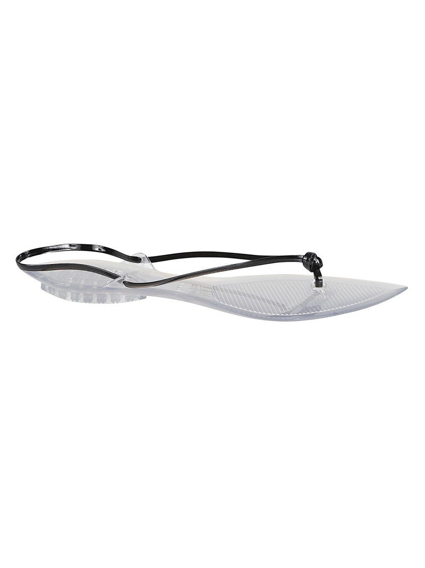Alaïa Flat Thong Sandals With Glossy Finish And Pointed Details