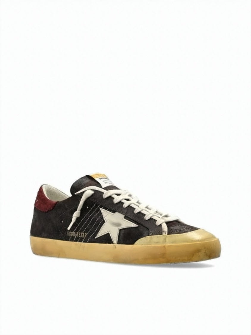 Golden Goose Distressed Black Suede Low-Top Sneakers With Contrasting Star Emblem