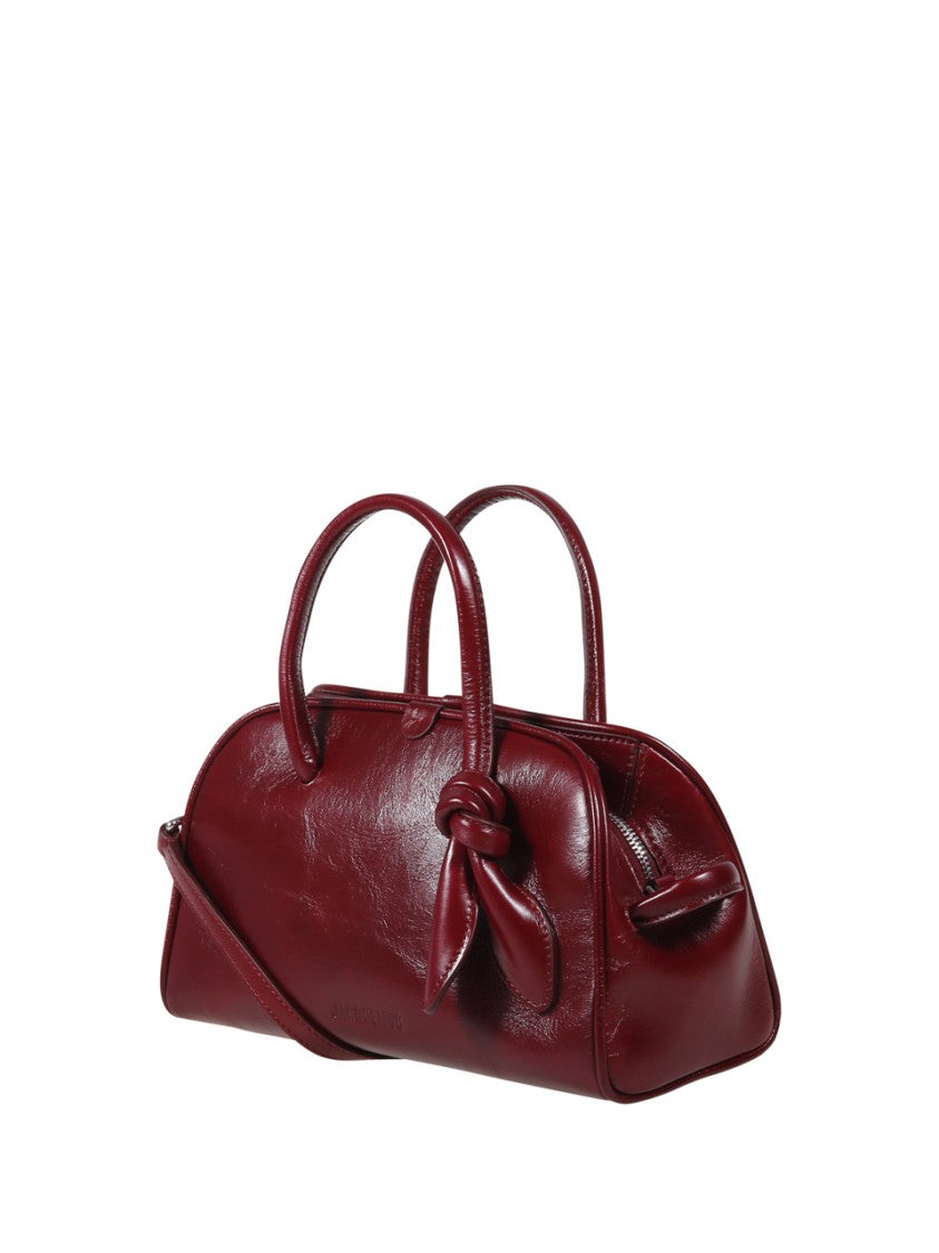 Jacquemus Elongated Burgundy Leather Bag With Knot Detail