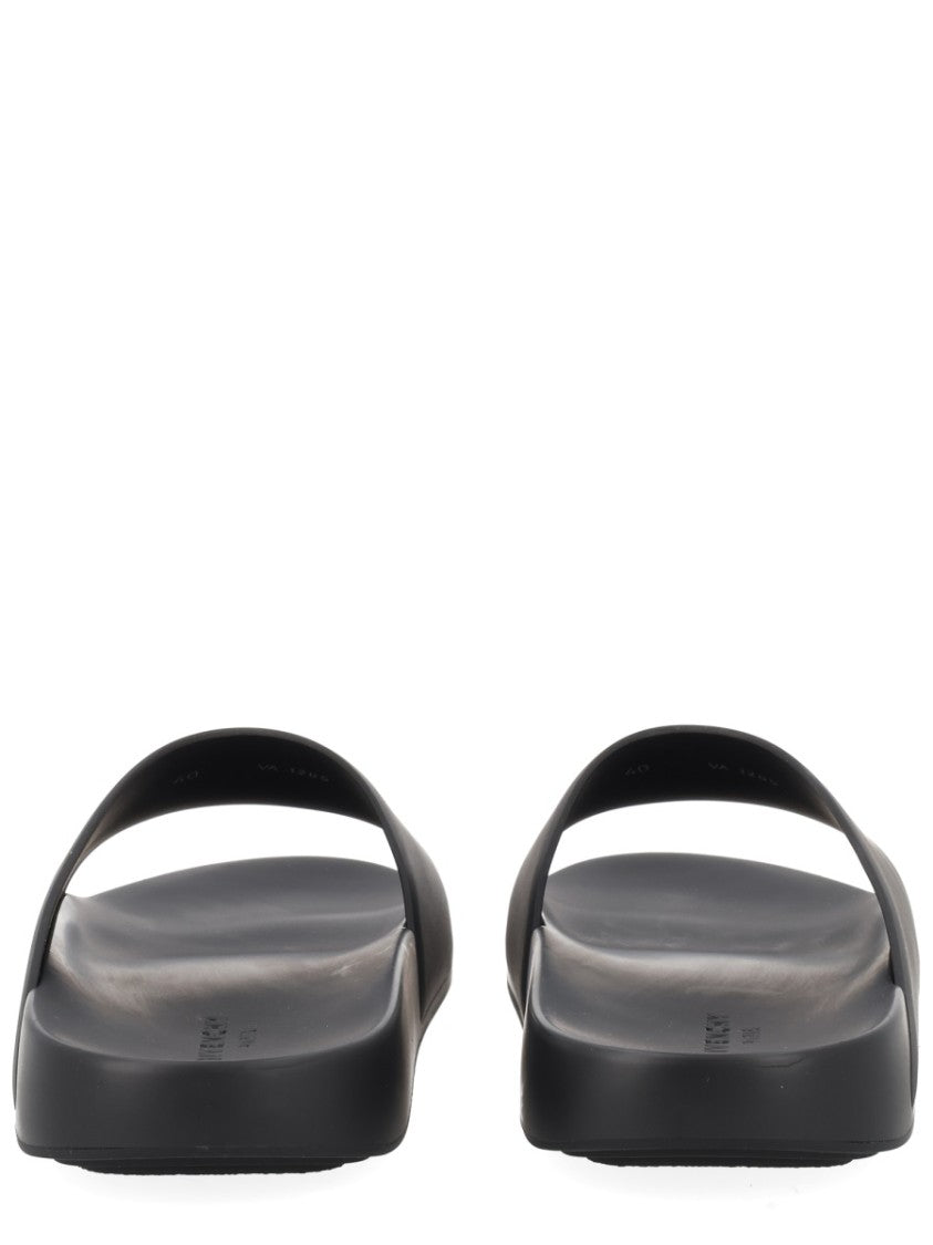 Givenchy Minimalist Black Slide Sandals With Contrasting Label