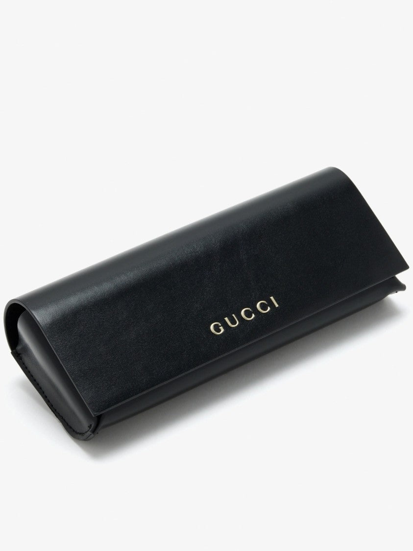 Gucci Cat-Eye Sunglasses With Glossy Black Frame And Silver Logo