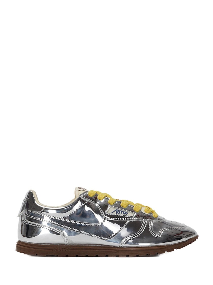Autry Front Lace Sneakers In Bright Yellow And Shiny Silver