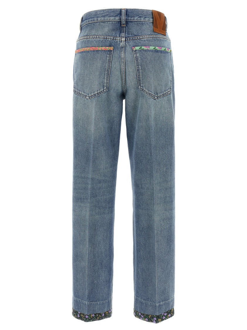 Valentino Garavani Medium Blue Floral Piped Jeans With Relaxed Fit