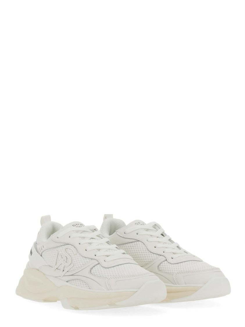 Stuart Weitzman Textured White Sneakers With Prominent Logo