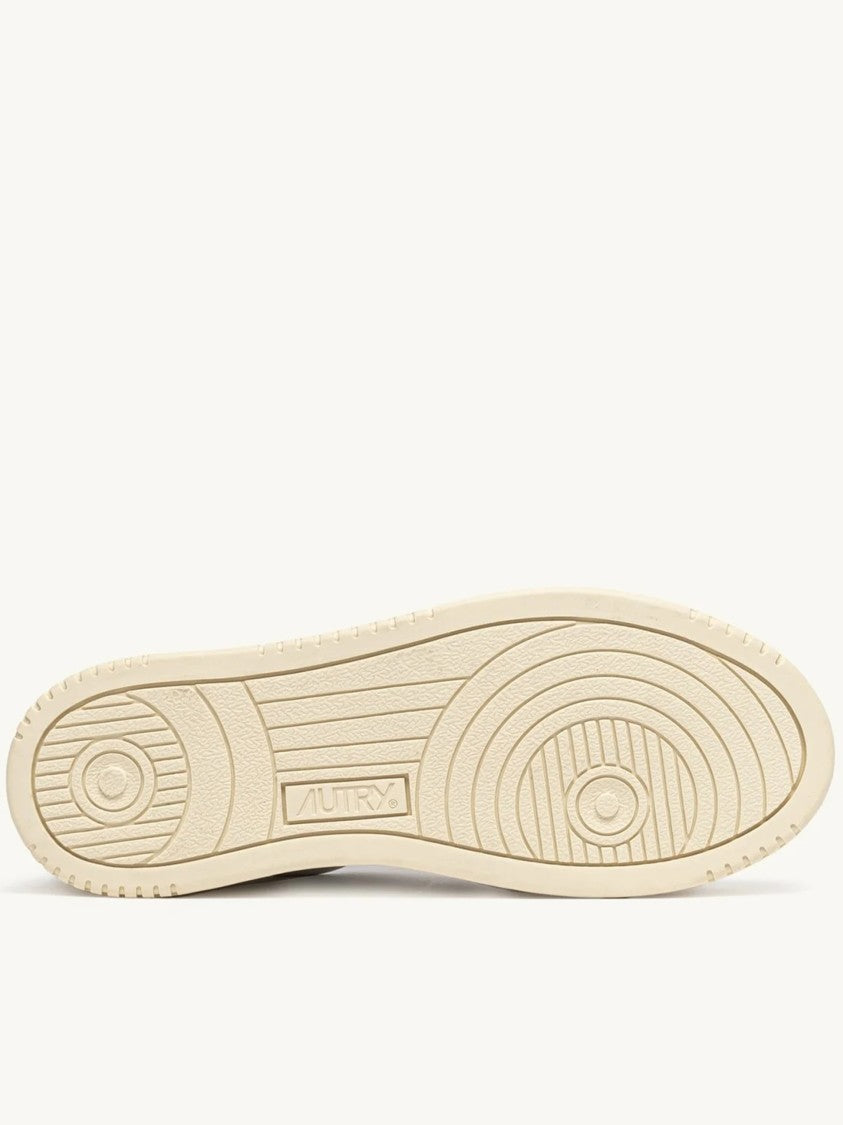 Autry Low-Top Sneakers With Perforated Detailing And Vintage Aesthetic