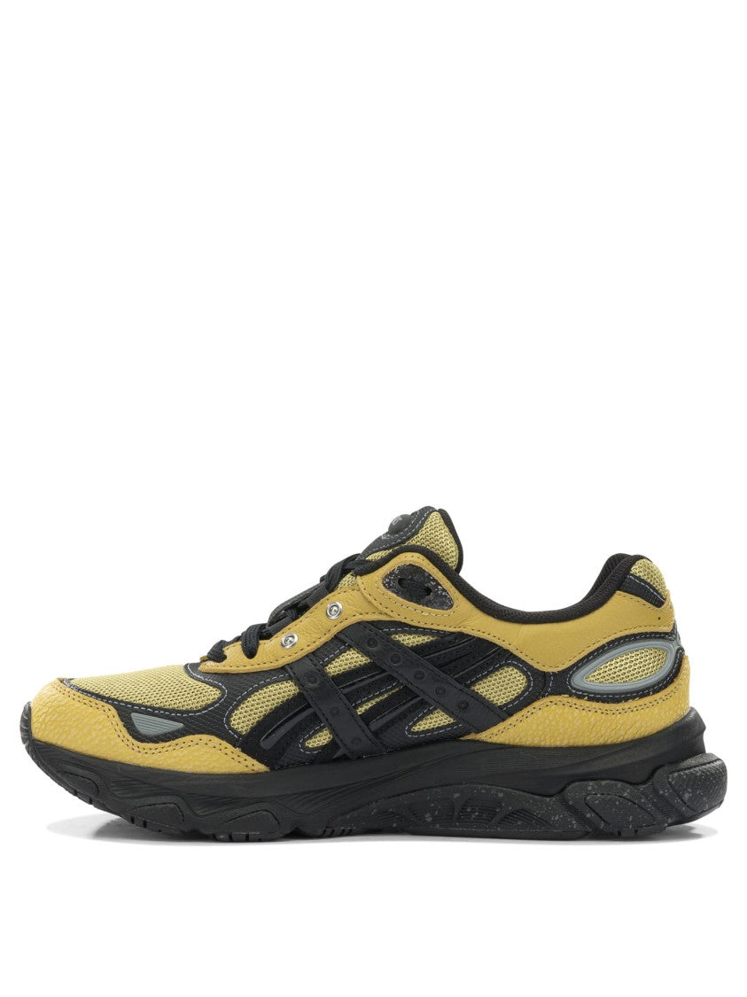 Asics Sporty Yellow And Black Sneakers With Textured Sole