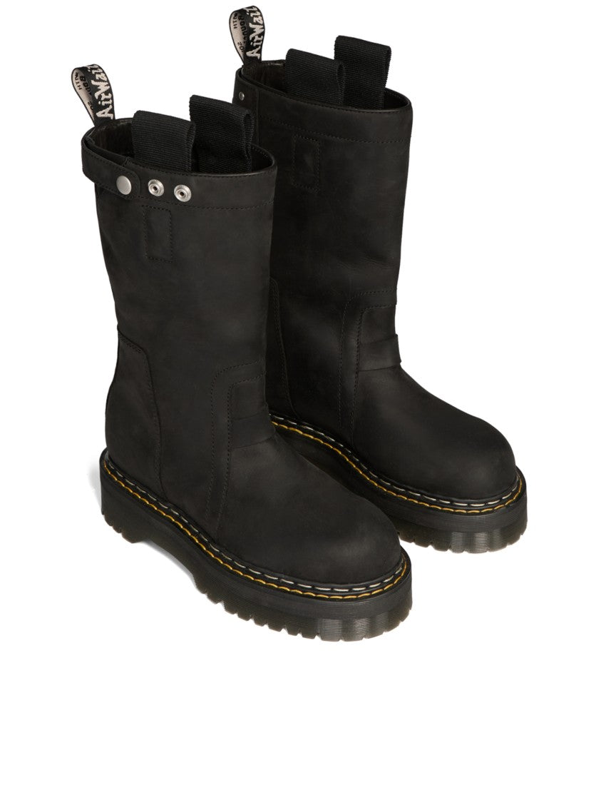 Dr. Martens Mid-Calf Pull-On Boots With Chunky Ridged Sole And Rugged Detailing