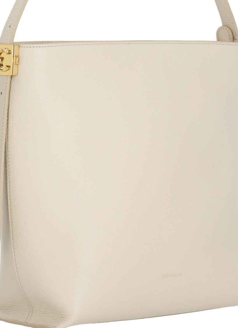 Coccinelle C-Me Lock Bag With Structured Silhouette And Golden Accents