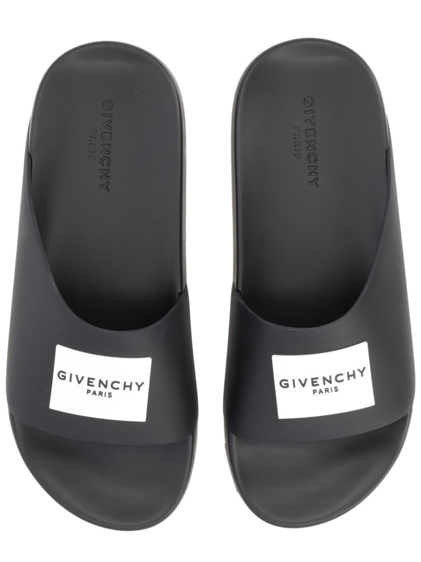 Givenchy Minimalist Black Slide Sandals With Contrasting Label