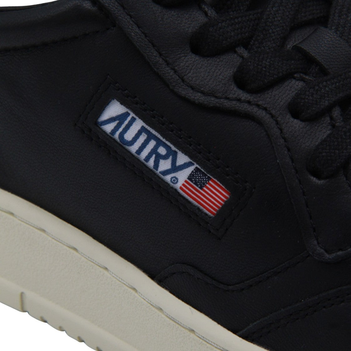 Autry Low-Top Black Sneakers With Subtle Perforations
