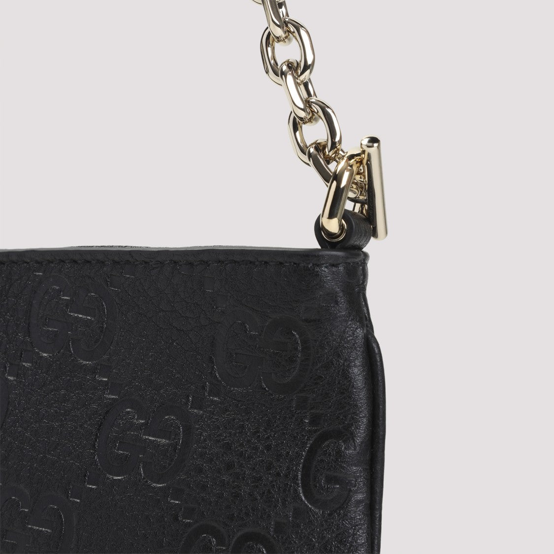Gucci Compact Black Leather Clutch With Embossed Gg Pattern