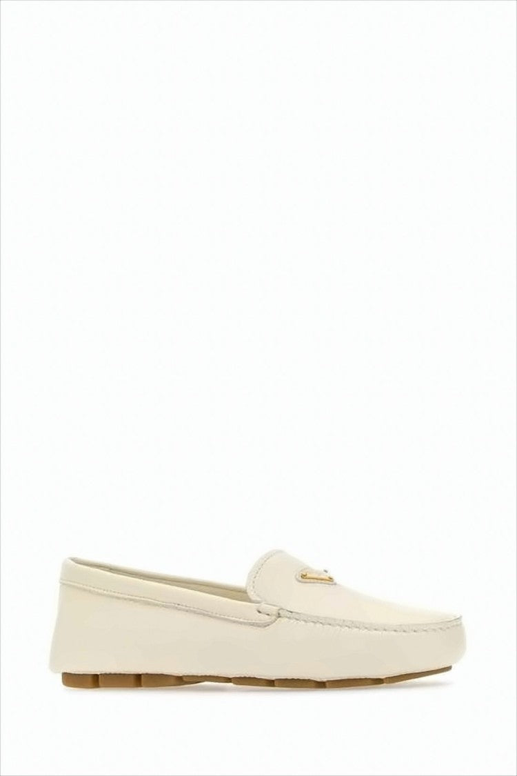 Prada Minimalist Leather Loafers With Rounded Toe And Subtle Stitching