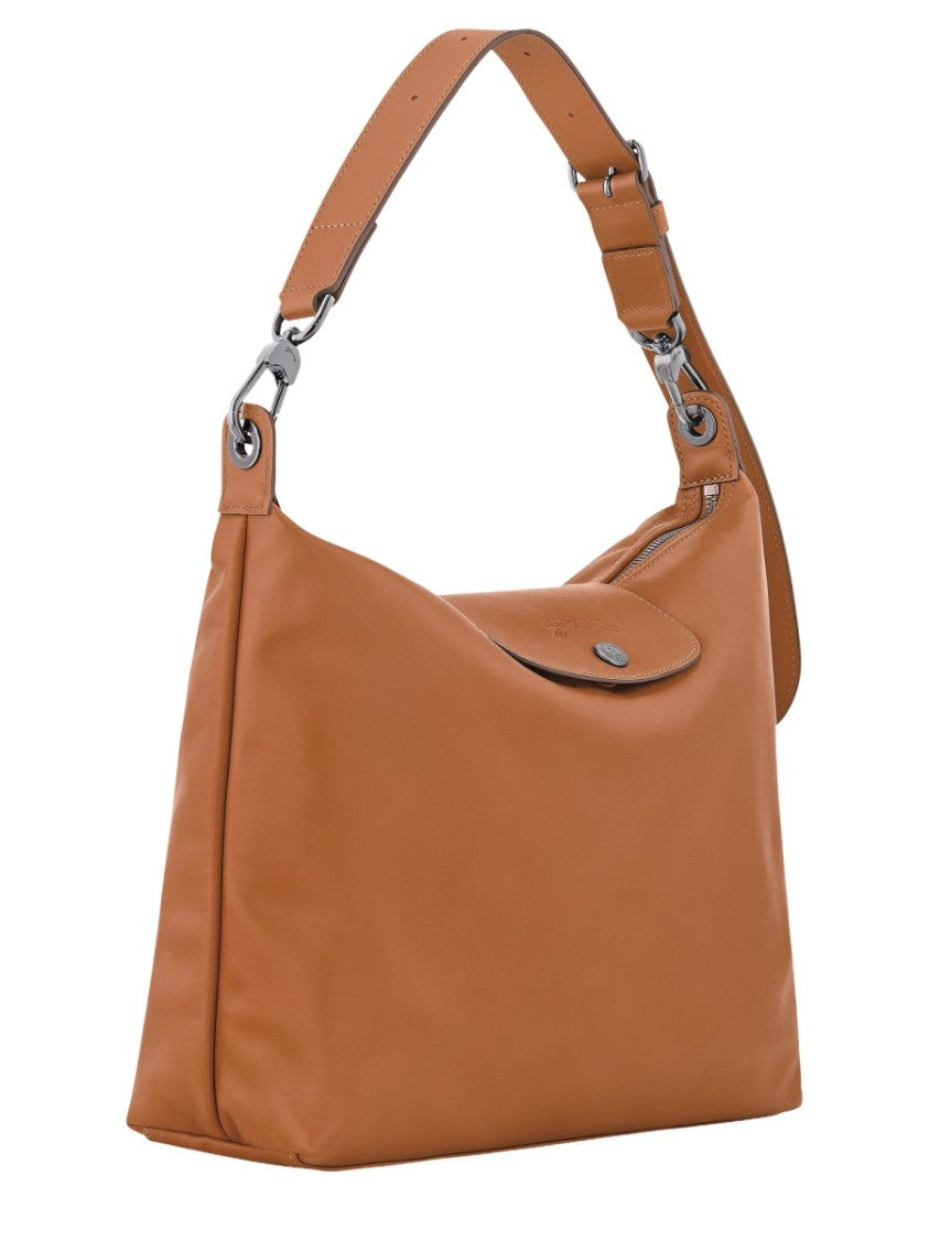Longchamp Medium Leather Hobo Bag With Adjustable Shoulder Strap And Flap Closure