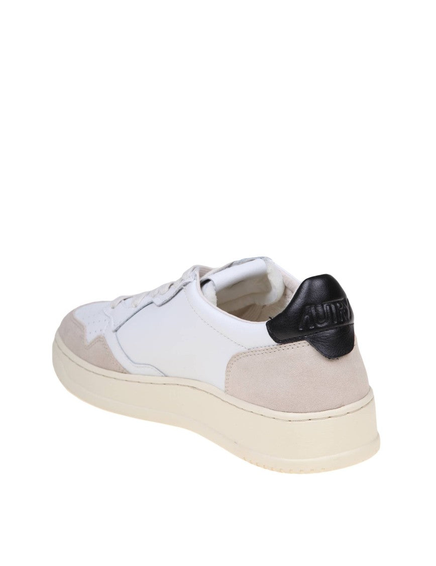 Autry Sneakers In Black And White Leather And Suede