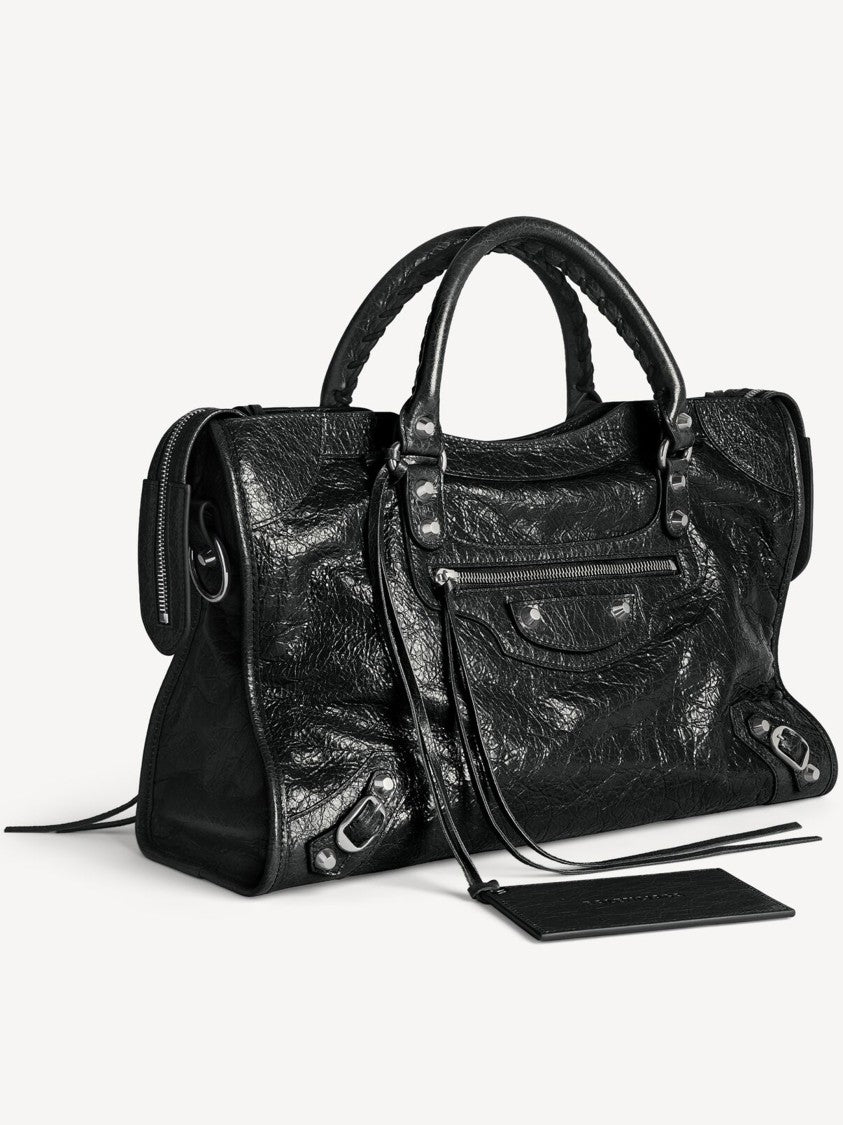 Balenciaga Textured Black Leather Shoulder Bag With Decorative Studs And Tassels