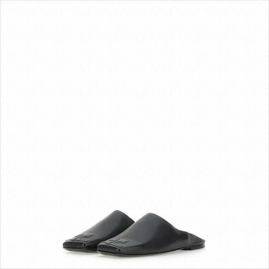 Courrèges Minimalist Black Lambskin Slip-On Mules With Embossed Detail