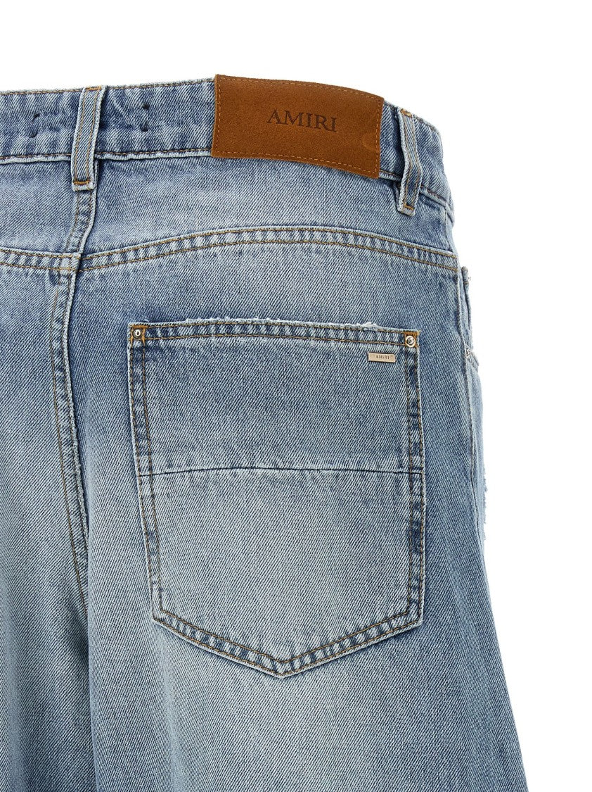 Amiri Stone Washed Denim Jeans With Panel Construction And Cargo Pockets