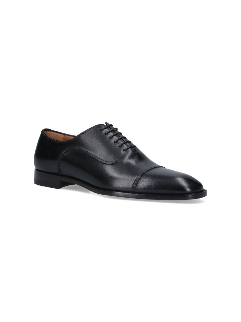 Christian Louboutin "Seriox" Derby Shoes – Black