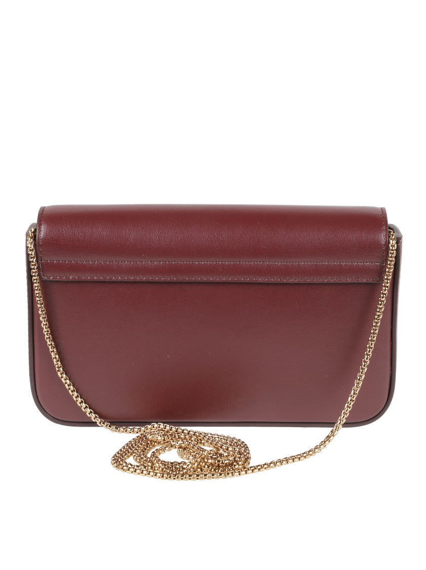 Tod's Rectangular Burgundy Bag With Gold-Tone Bar