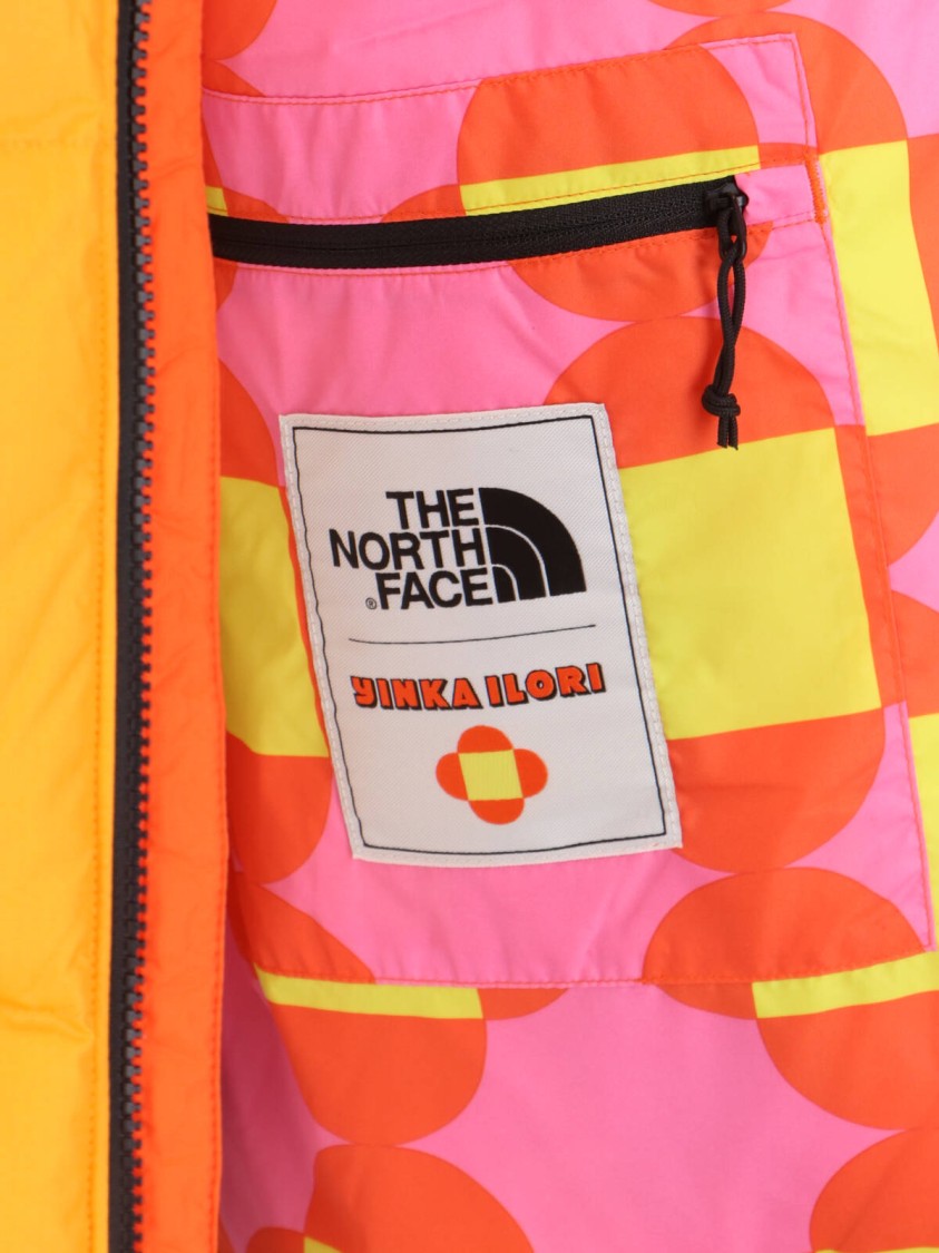 The North Face Two-Tone Padded Gilet In Orange And Yellow Nylon
